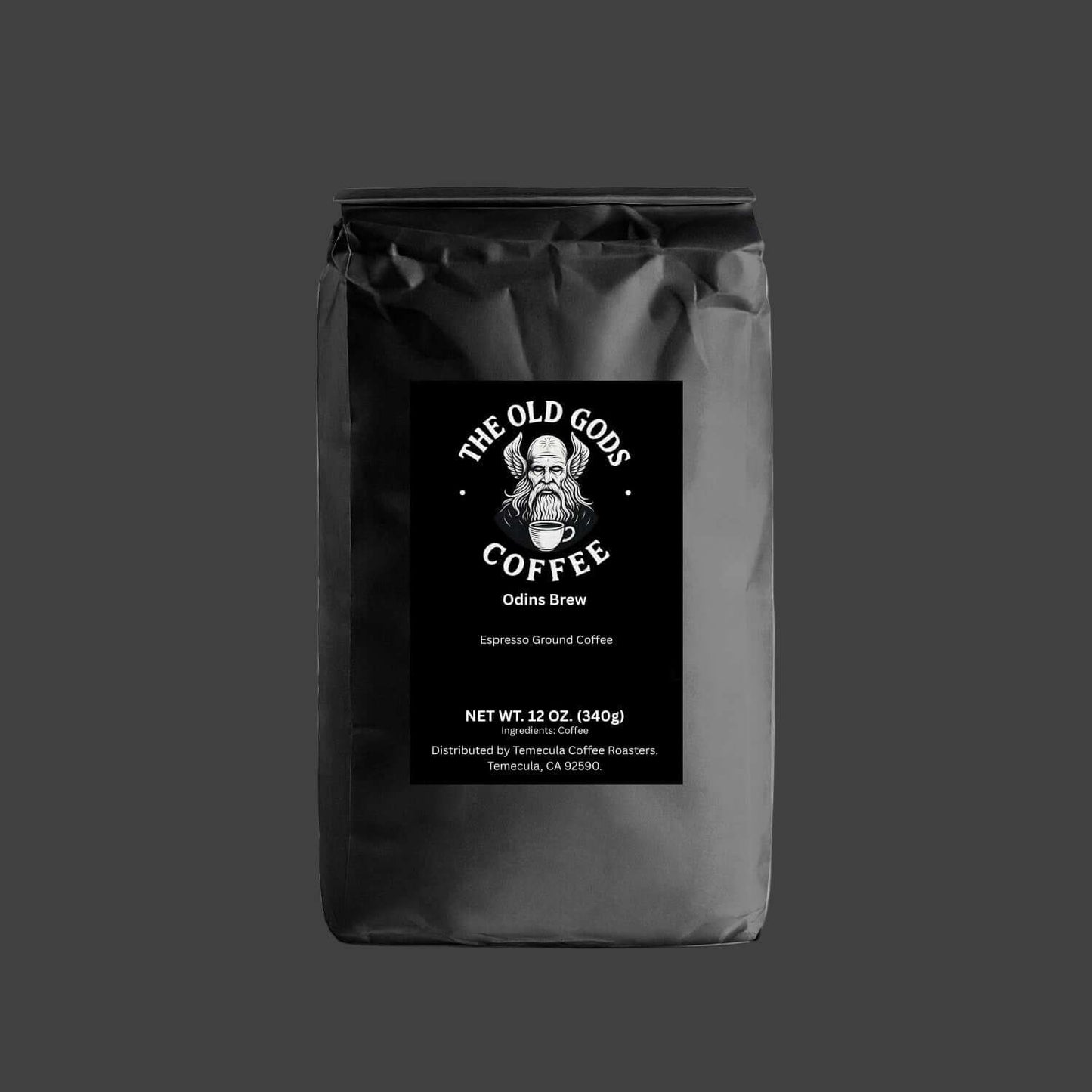 Black coffee bag with 'The Old Gods Coffee' logo on a white background