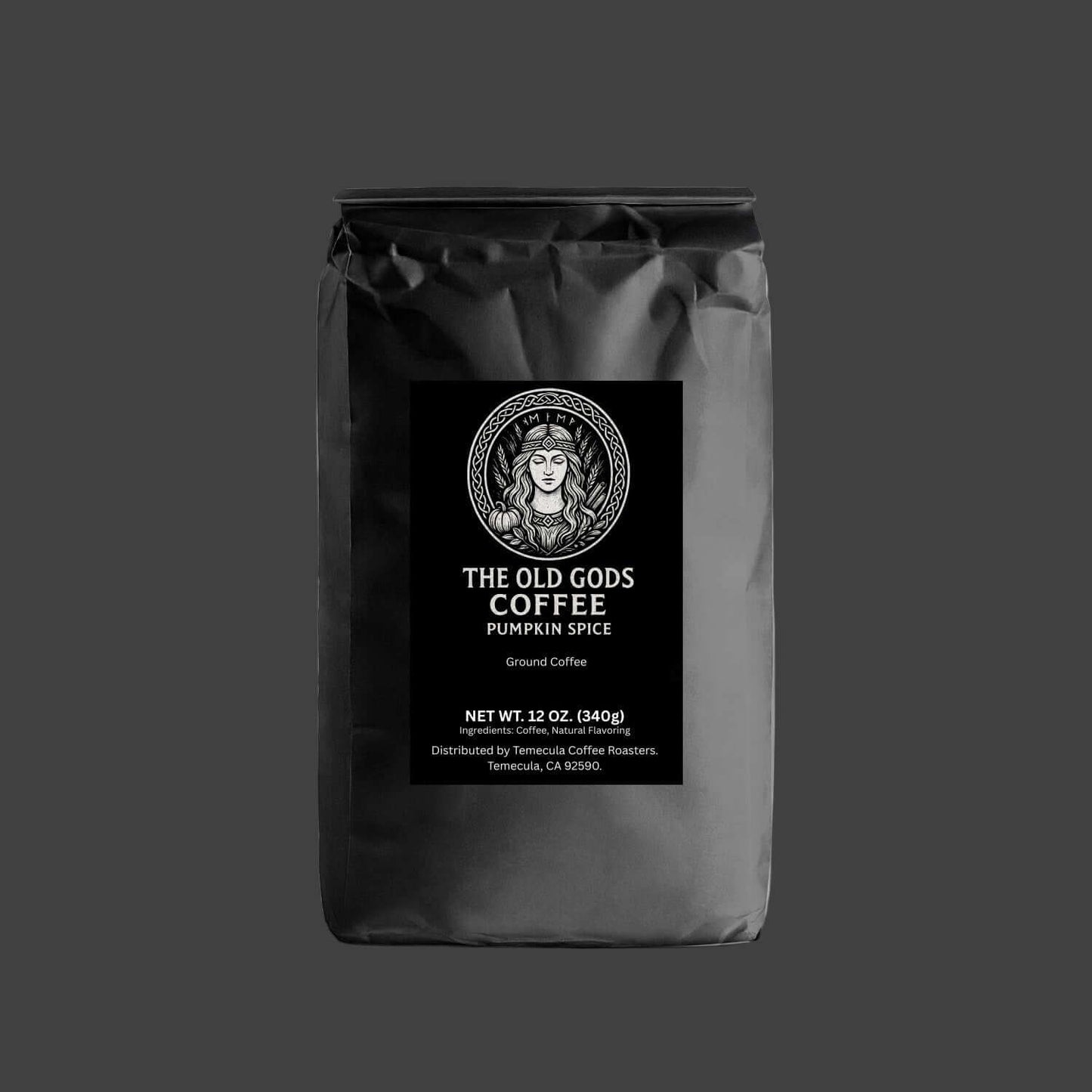 Black coffee bag with 'The Old Gods Coffee' label on a white background