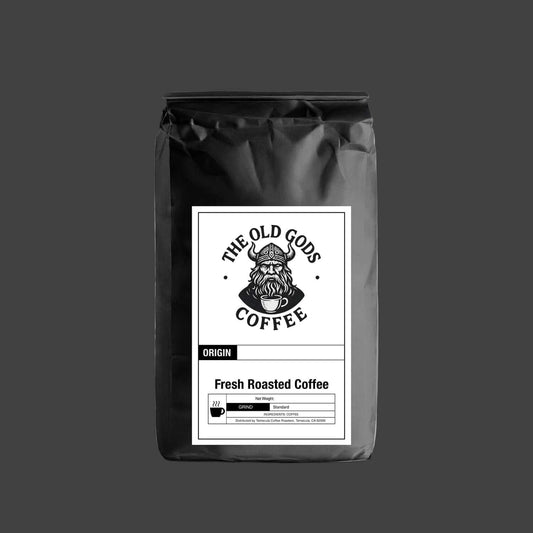 Fresh roasted coffee bag from The Old Gods Coffee featuring a distinctive logo and packaging design.